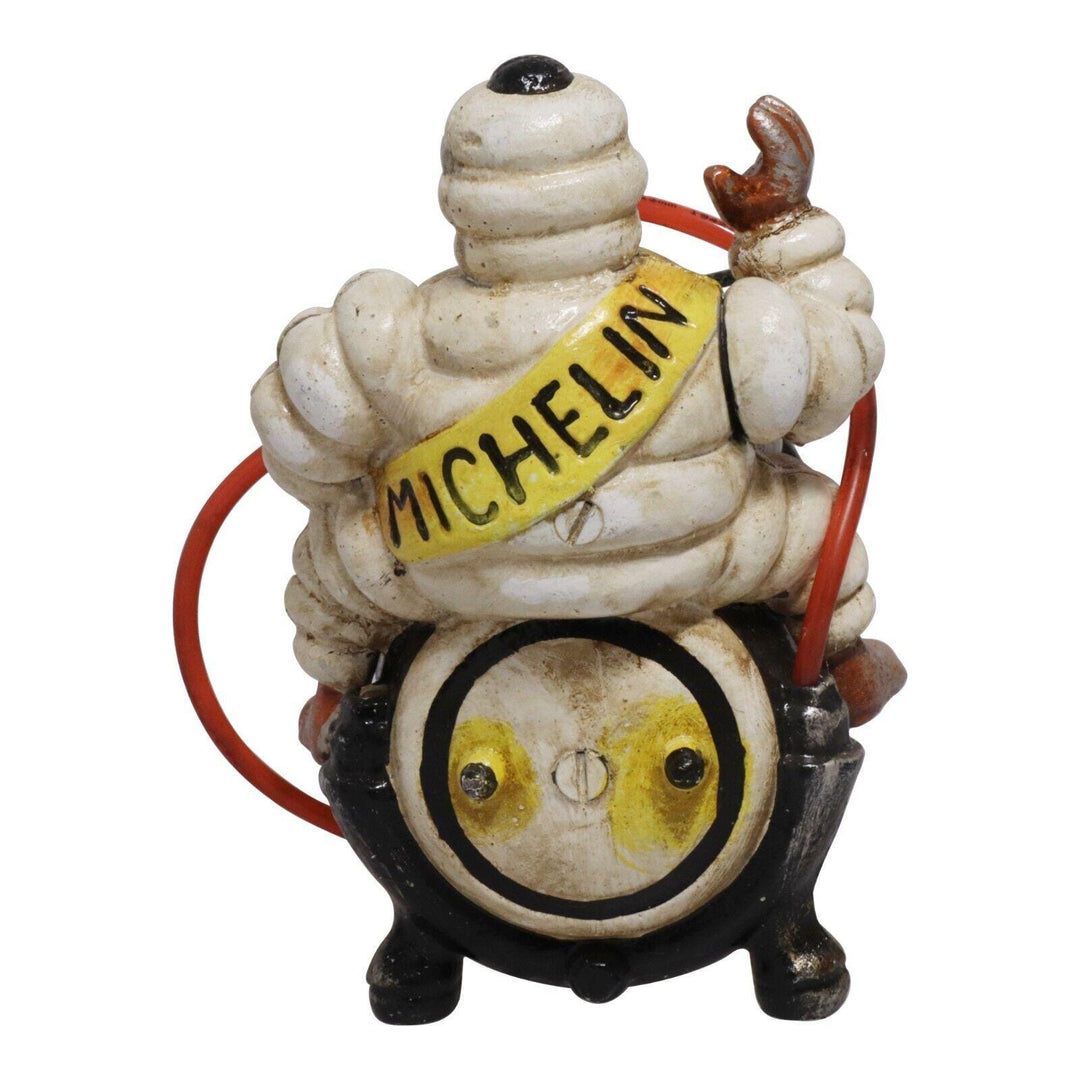 Cast Iron Michelin Man Sat On Compressor Ornament